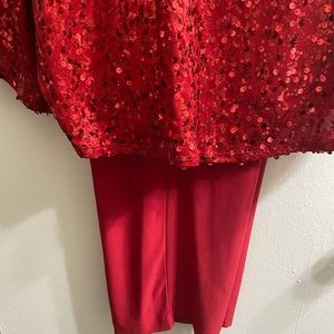 This is a beautiful red women’s very dressy pant suit.